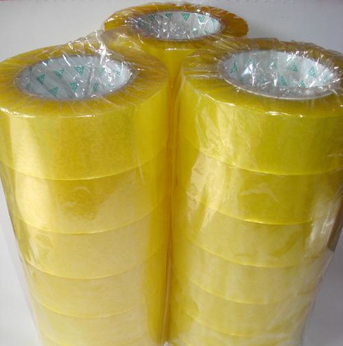 Băng dính đóng hàng. Khổ cuộn: 2.4cm. Khối lượng: 1kg/cuộn. Màu sắc: Vàng đậm
