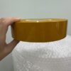 Băng dính đóng hàng. Khổ cuộn: 2.4cm. Khối lượng: 0.5kg/cuộn. Màu sắc: Vàng đậm